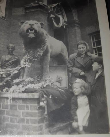 CREDIT: Robert Cheverton - Lion outside Arnold house. The little girl in the foreground is my sister June Howard(Cheverton).Granddaughter of Jack Cleveland