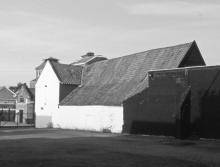 Lowestoft’s only remaining barn from the Early Modern period - No. 34 Crown Street West (Crown Street Motors). An aisled structure, re-roofed during the second half of the 19th century and with cross-wing added at the front, its ground-floor framing was thought to date from c. 1500. Radio-carbon dating, using samples from five of the individual timbers, showed that the oak was felled during the winter of 1609-10. The building once served as the parish tithe barn Barn